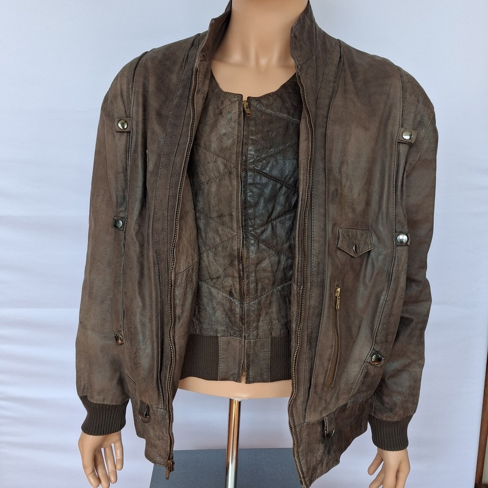 Men's vintage brown leather bomber jacket with a matching zip-out quilted vest